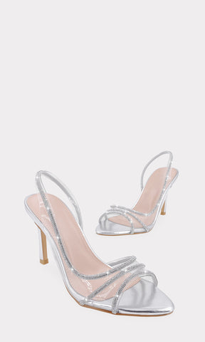 AIMEE ZAPATILLAS PLATEADAS CON BRILLOS EN MICA TRANSPARENTE CONFECCIONADAS EN VINIPIEL METALICA DE TACON ALTO DE 9.5 CM Y TERMINACION POINTY PARA CHICA