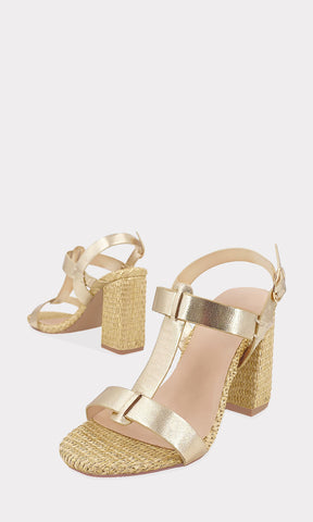 ALESSA TACONES DORADOS CONFECCIONADOS EN VINIPIEL METALICA CON HEBILLA METALICA DE FORMA OVALDA EN CINTA TALONERA AJUSTABLE PARA MUJER FASHION