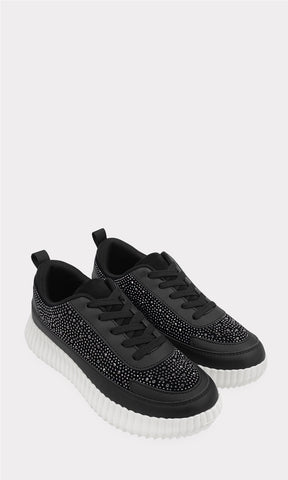 BRIGITTE SNEAKERS NEGROS CON BRILLO AL FRENTE CONFECCIONADOS EN VINIPIEL CON SUELA DENTADA DE 4 CM Y AGUJETA TEXTIL SOBRE EL EMPEINE PARA MUJER 