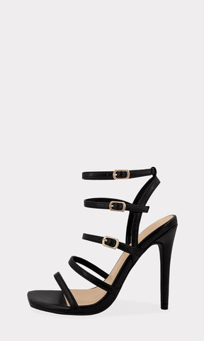 FIERCE HEELS DESTALONADOS DE PIEL SINTETICA COLOR NEGRO CON TACON DE 11 CM Y TIRAS DELGADAS EN EMPEINE