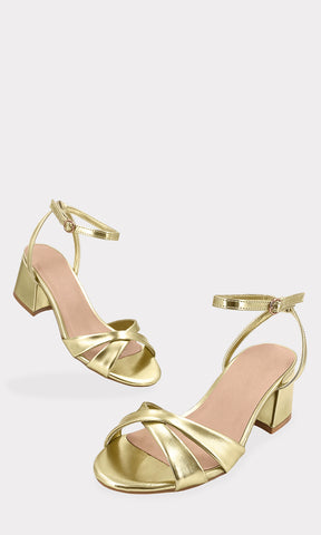 JULIEN ZAPATILLAS DORADAS CON TACON CUADRADO DE 5.5 CM CONFEECCIONADAS EN VINIPIEL METALICA Y HEBILLA PEQUEÑA EN PULSERA TOBILLERA PARA MUJER