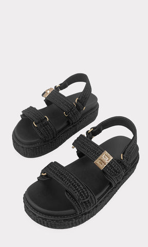 LILIANA SANDALIAS NEGRAS PARA USAR EN PRIMAVERA-VERANO CONFECCIONADAS EN YUTE SINTETICO CON SUELA PLANA DE 5.5 CM Y STRAPS DE VELCRO AL FRENTE