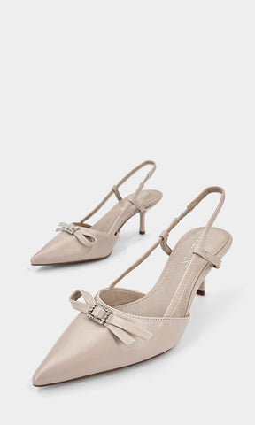 LUCIE TACONES COLOR NUDE CONFECCIONADOS EN VINIPIEL CON HEBILLA DE BRILLOS EN MOÑO PEQUEÑO AL FRENTE CON TALON DESCUBIERTO PARA MUJER