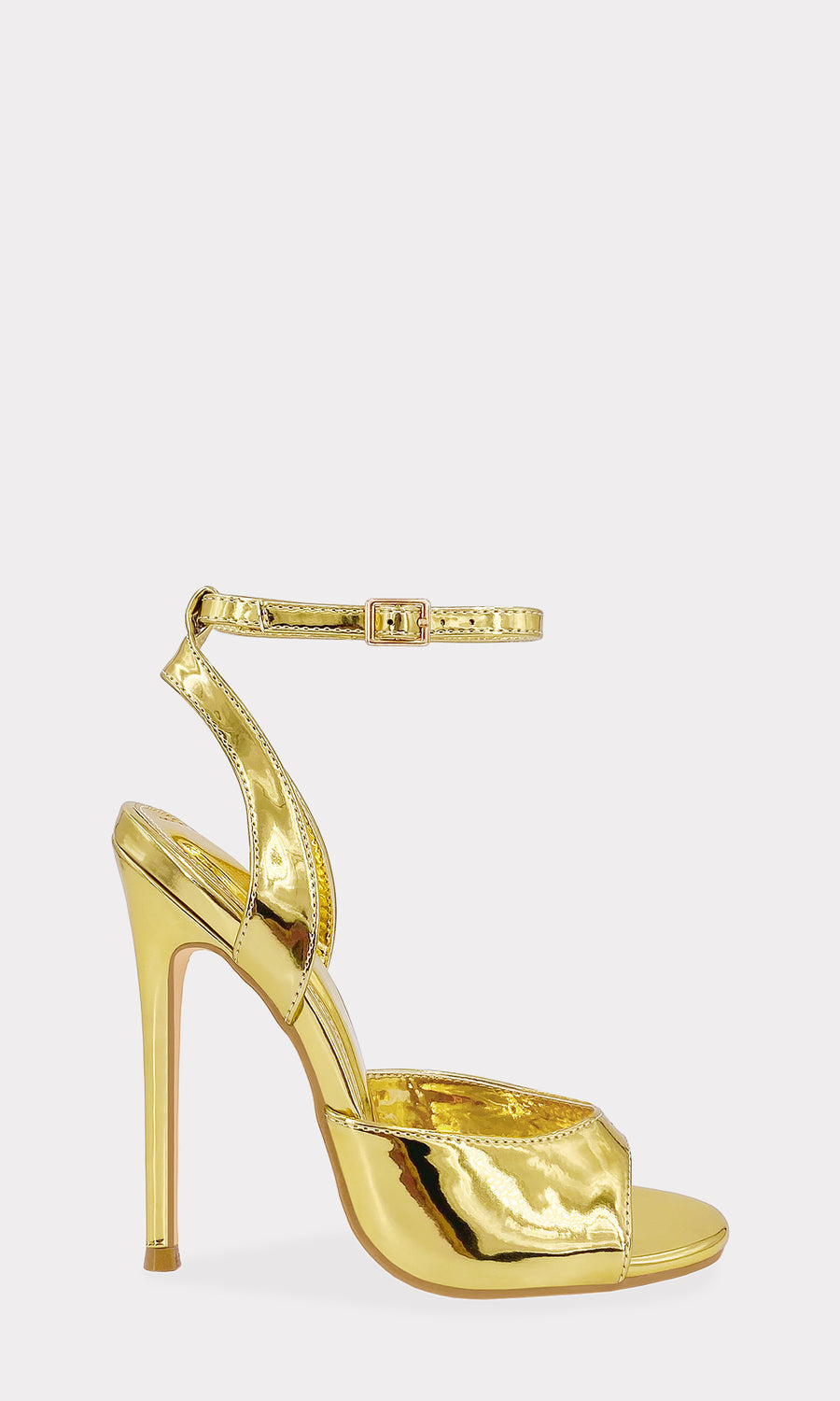 MICHELLE TACONES DORADOS DE MODA PARA LUCIR CON VESTIDO ROJO DRAPEADO Y VERSE SEXY EN CENAS ROMANTICAS CON TU PAREJA