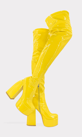 MOTOMAMI BOTAS AL MUSLO DE CHAROL ELASTICO COLOR AMARILLO Y TACON GRUESO PARA USAR EN ANTROS