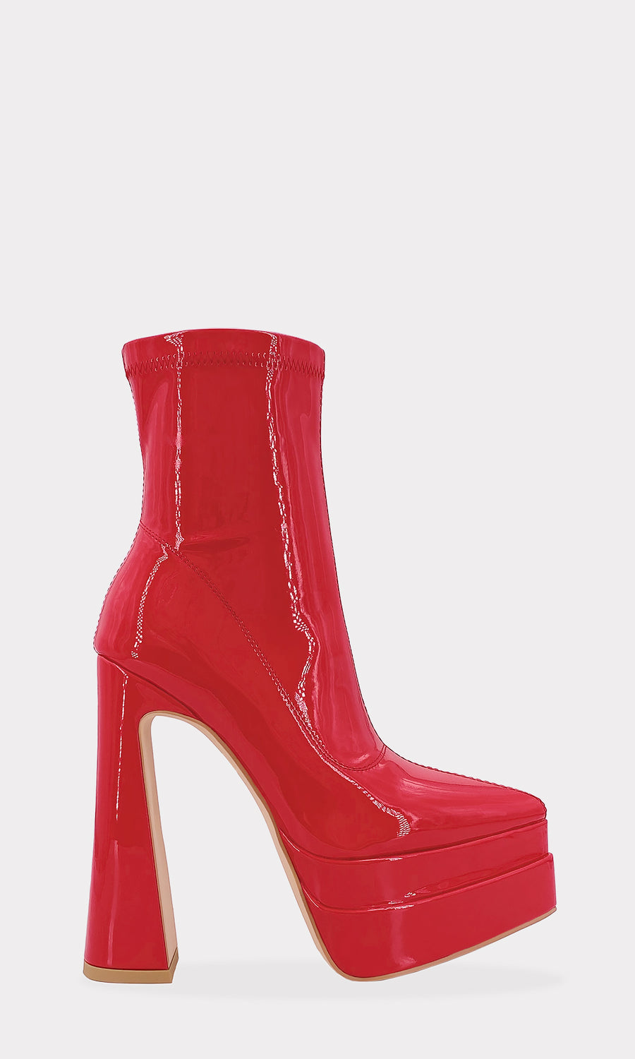 SUPREME ANKLE BOOTS DE CHAROL ROJO CON TERMINACION POINTY PARA LUCIR FALDAS DE ANIMAL PRINT Y BLUSA NEGRA CON ANILLOS