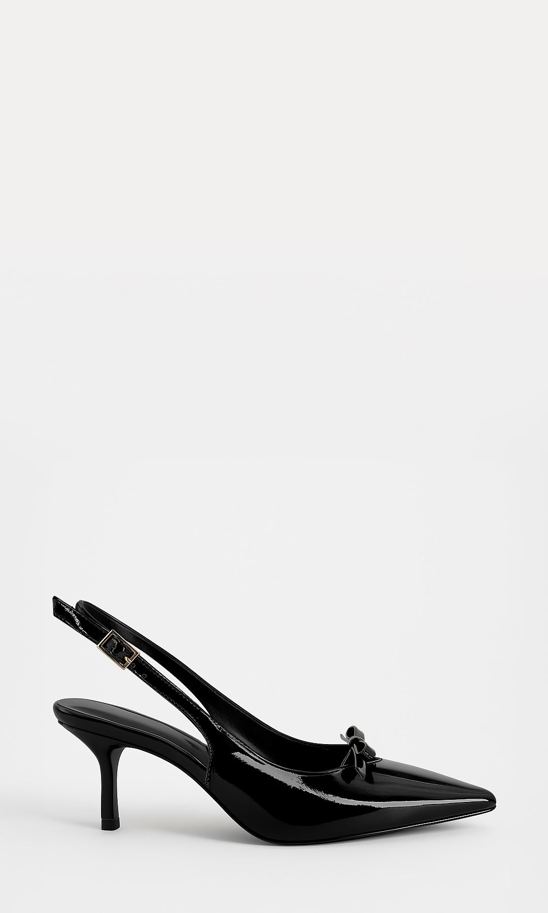 SYLVIA ZAPATILLAS CERRADAS DE TERMINACION PUNTIAGUDA CON DETALLE DE MOÑO AL FRENTE Y DELGADO