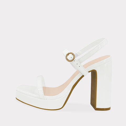 ADELLA HEELS DE CHAROL BLANCO CON SUELA FINA Y TACON SEMI CIRCULAR PARA USAR CON MINI FALDAS